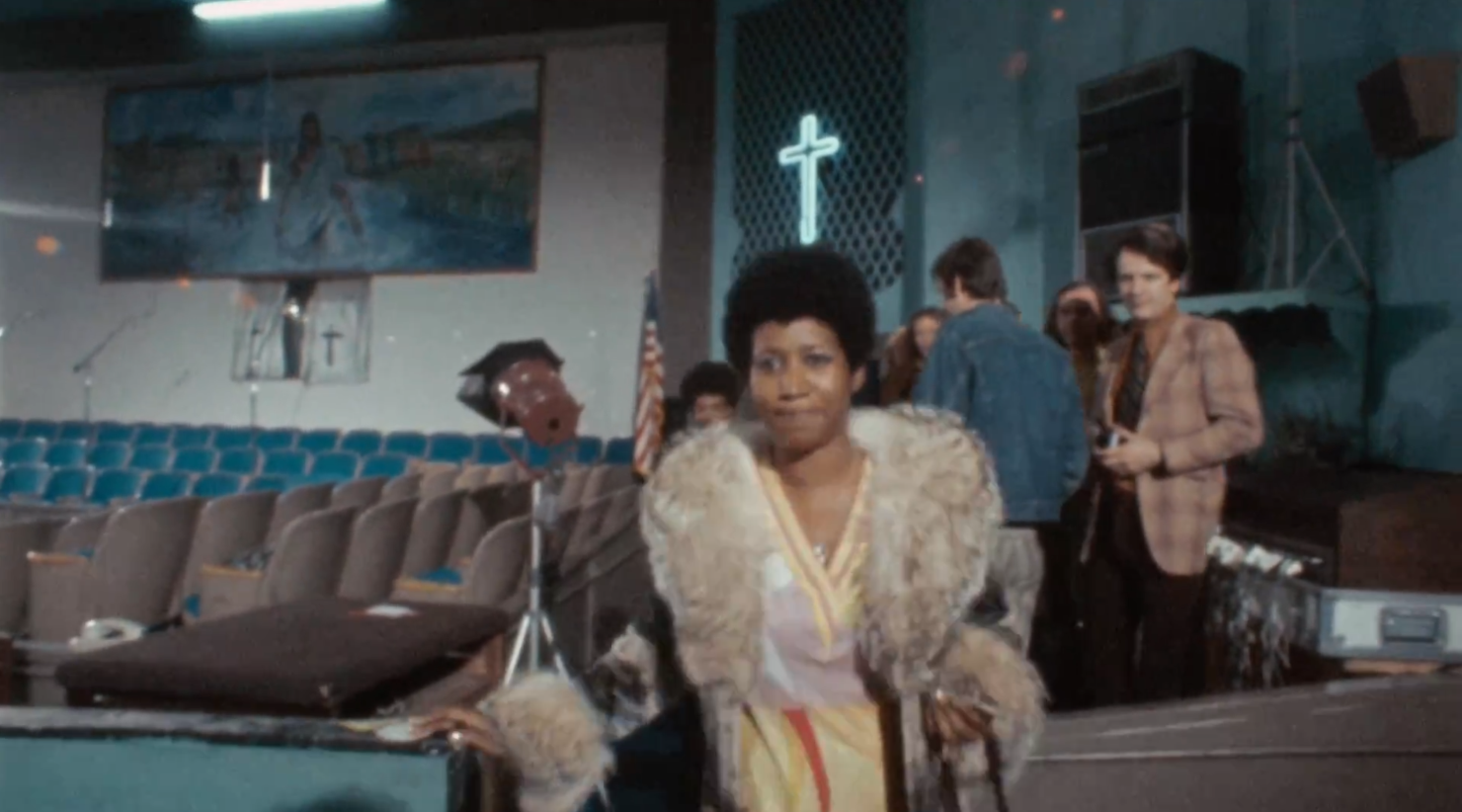 Aretha Franklin entering the church to perform